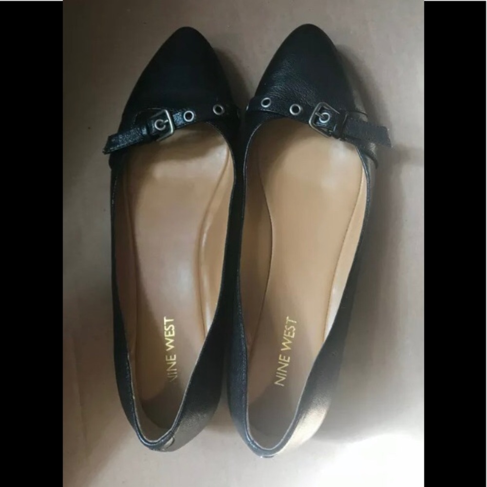 Nine West black flats with buckle detail
